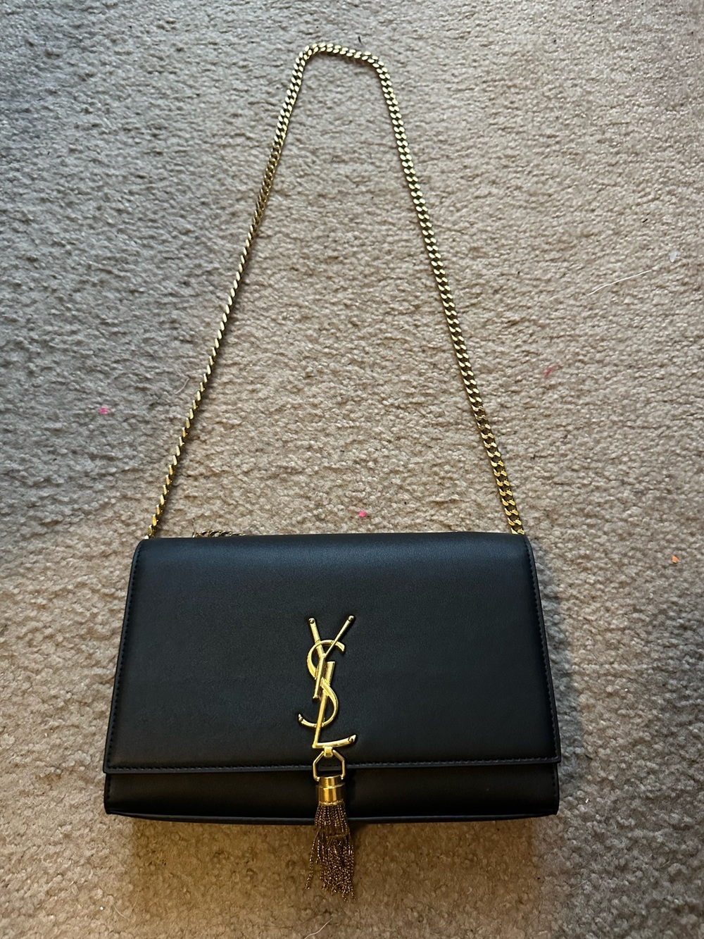 Black Leather Shoulder Bag with Gold Monogram and Tassel